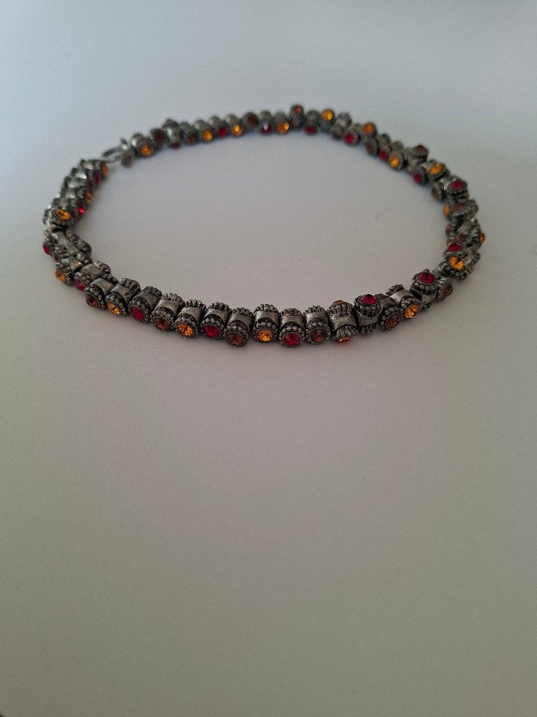 Stijlvolle Otazu schakelketting in kleuren rood/geel/oranje, Ophalen of Verzenden, Zo goed als nieuw, Oranje, Overige materialen