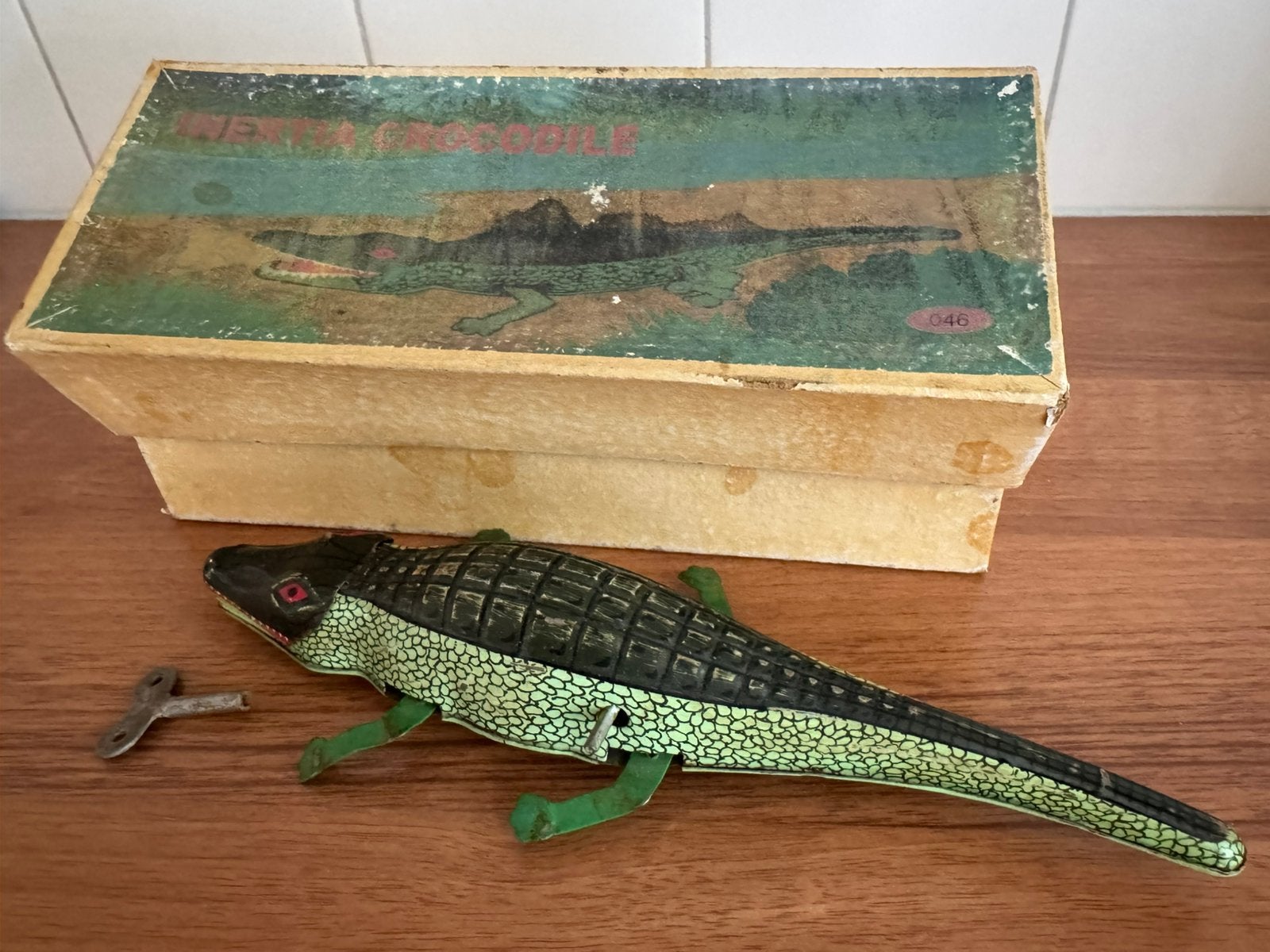 Oude blikken krokodil Inertia MS224 in originele doos, Ophalen of Verzenden