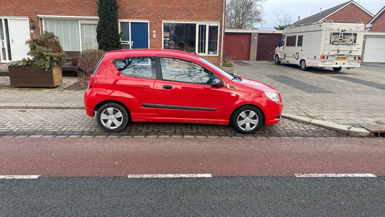 Chevrolet Aveo 1.2 16V 3D 2010 Rood, Voorwielaandrijving, 40 €/maand, Aveo, 4 cilinders