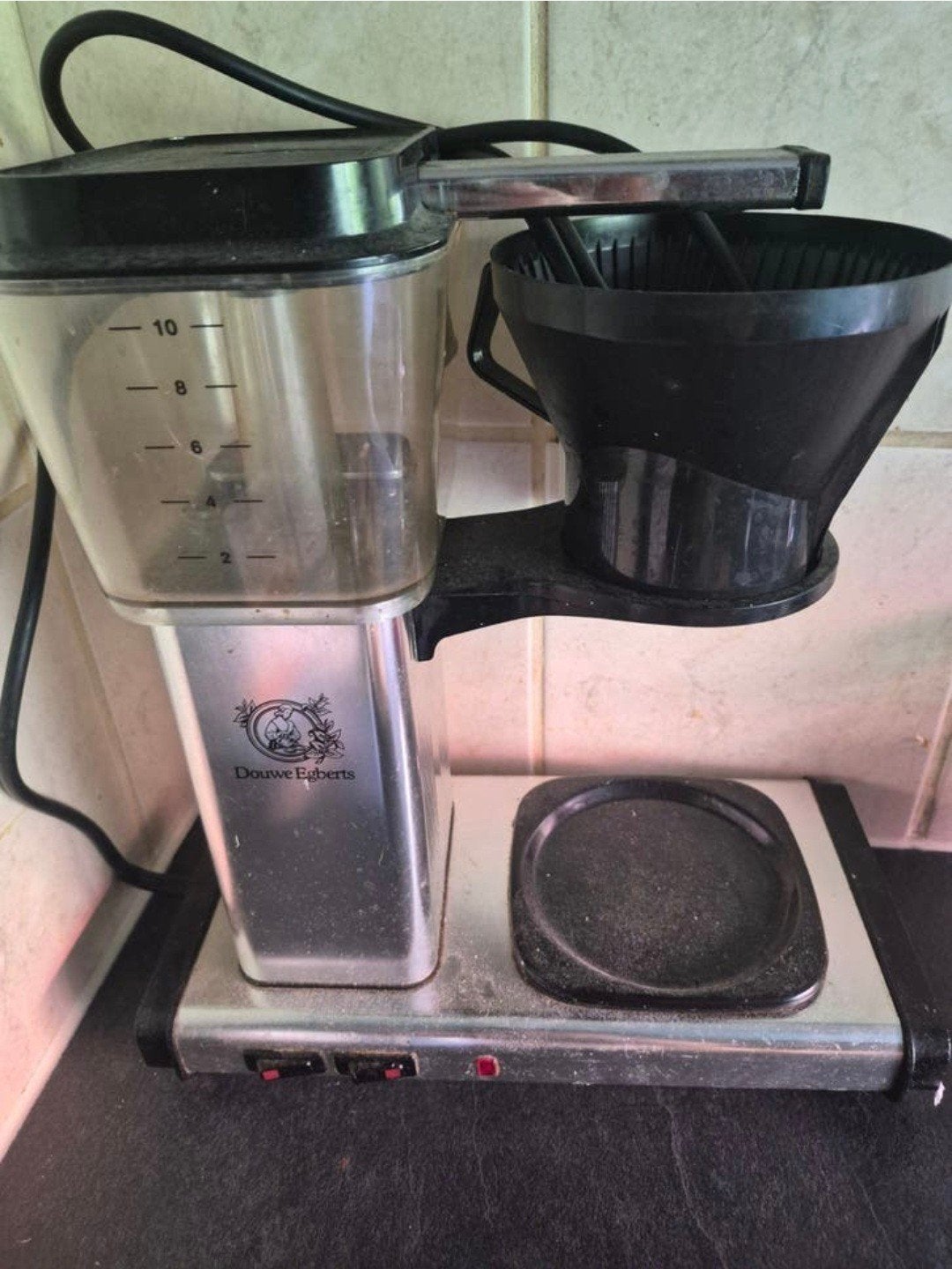 DE koffie zet apparaat koffiepot helaas gebroken, Ophalen