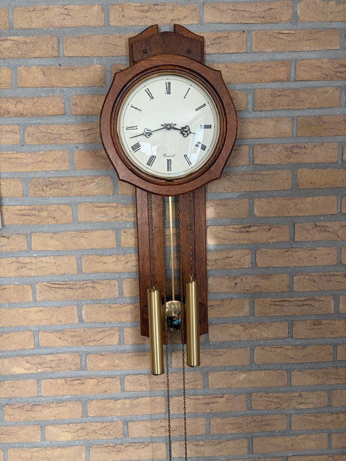Warmink wandklok met slinger en gewichten, Ophalen