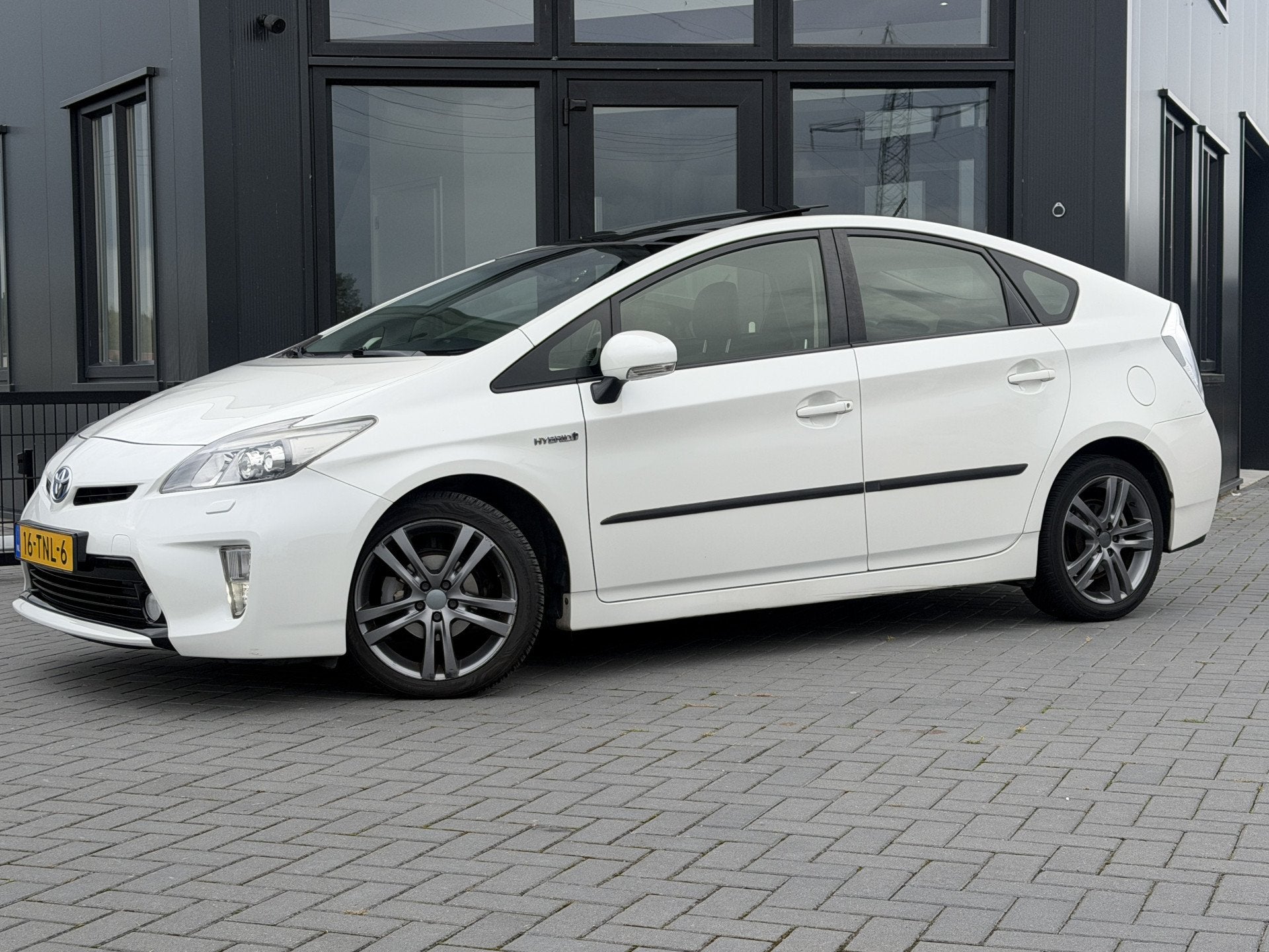 Toyota Prius 1.8 Dynamic Business JBL | Camera | Solar SK da, Euro 5, Gebruikt, 4 cilinders, Leder en Stof