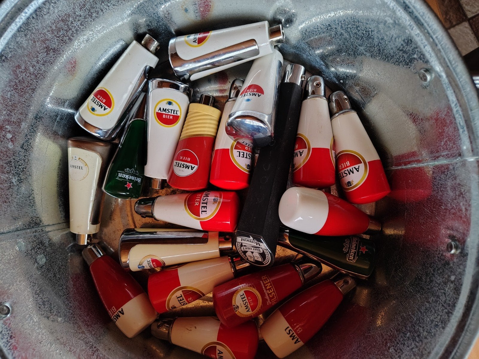 Gebruikte Amstel Tapknoppen/hendels 20 Stuks, Ophalen of Verzenden, Gebruikt, Amstel