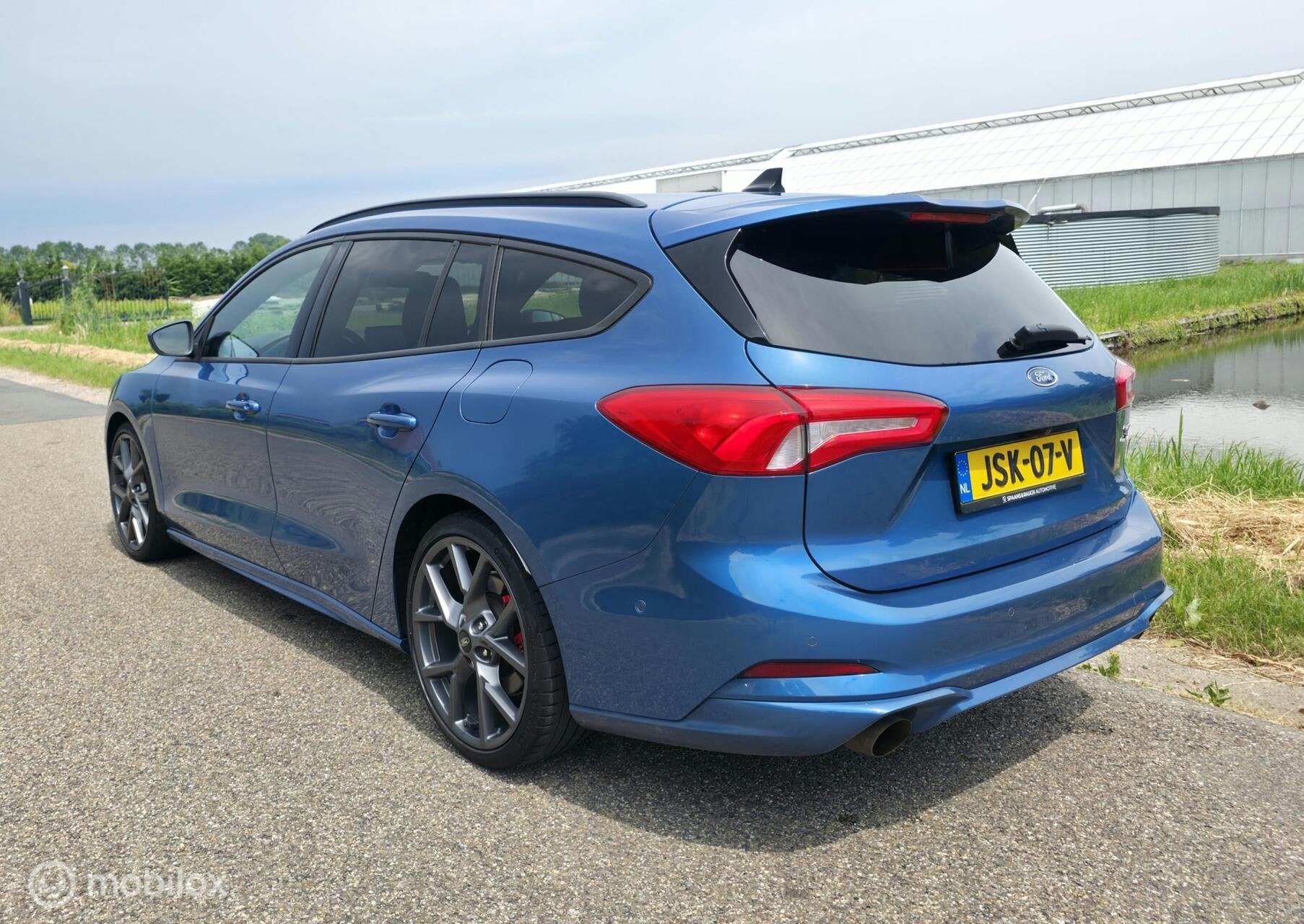 Ford Focus Wagon 2.3 EcoBoost ST-3 / B&O / Carplay / Camera, Auto's, Gebruikt, 4 cilinders, Blauw, Automatische klimaatregeling