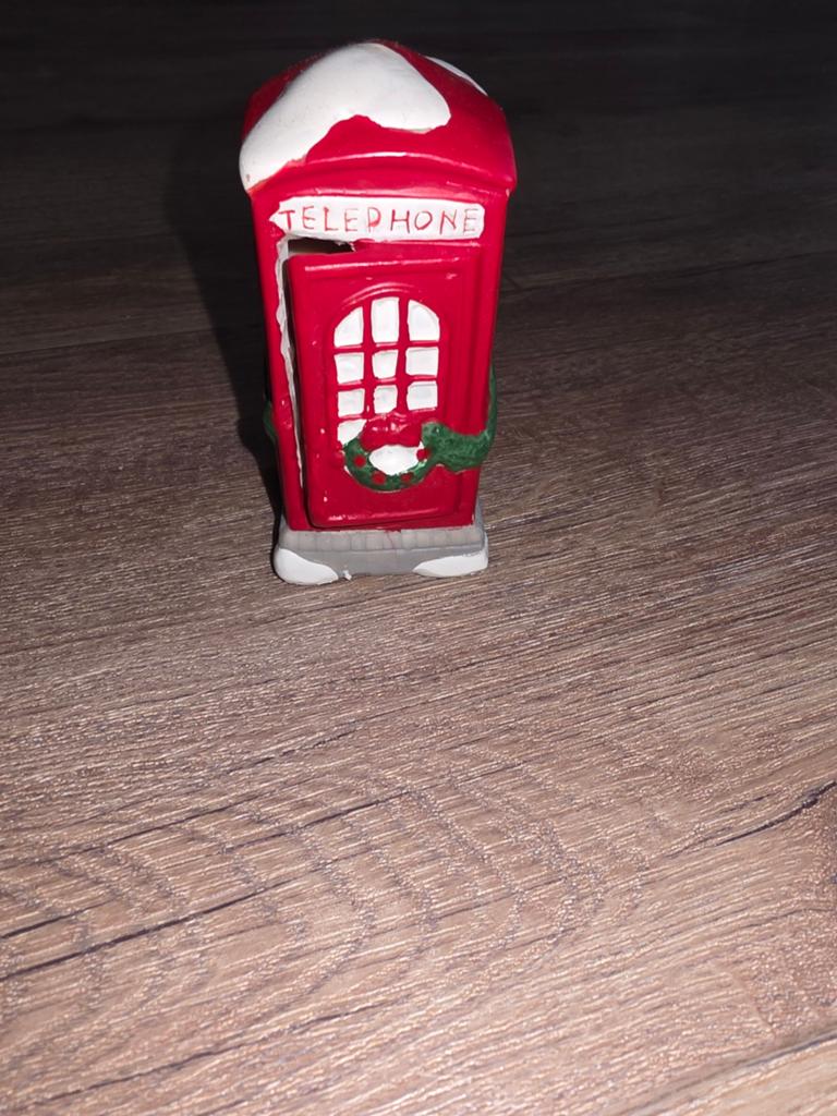 Dickensville Collectables telefooncel NM-61150, Ophalen
