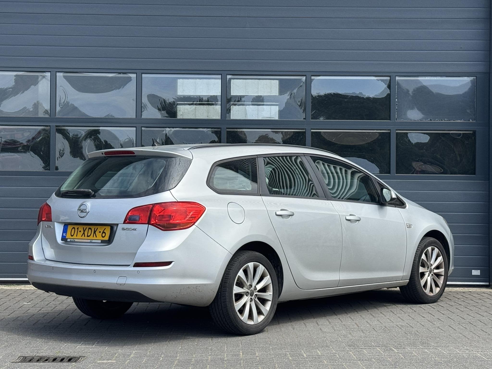 OPEL ASTRA SPORTS TOURER 1.4 ANNIVERSARY EDITION I MEENEEMPR, Auto's, Voorwielaandrijving, Gebruikt, 4 cilinders, Origineel Nederlands