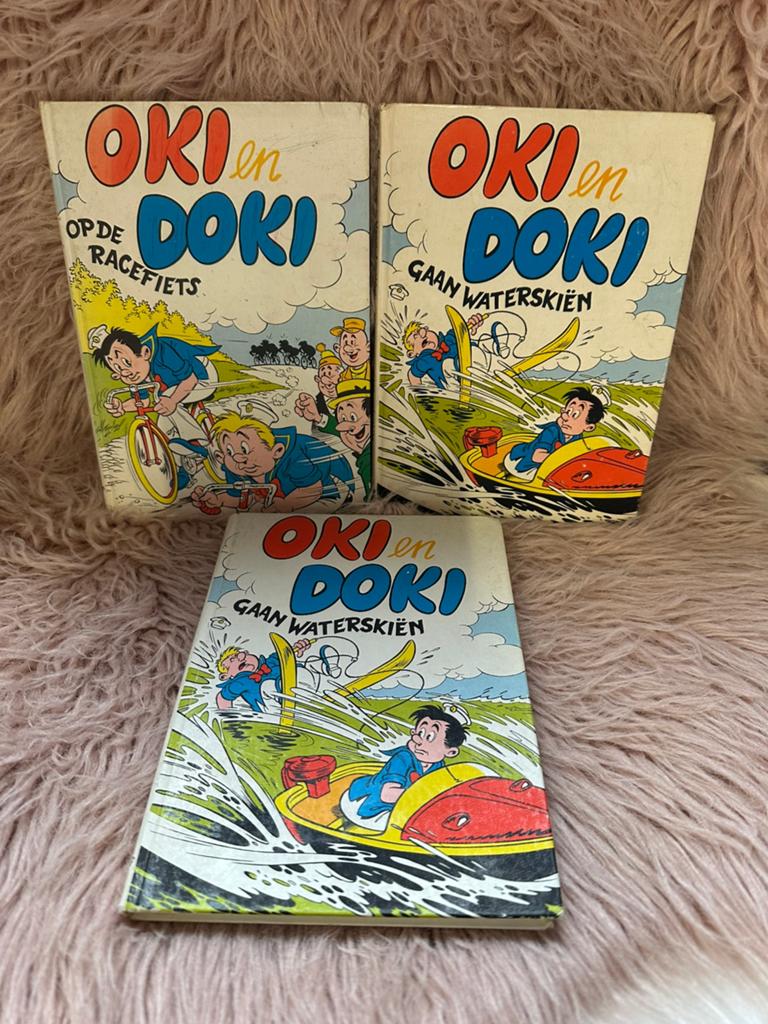 Oki en Doki/ op de fietsen en gaan waterskiën 2,50 p.stuk, Ophalen of Verzenden, Gelezen