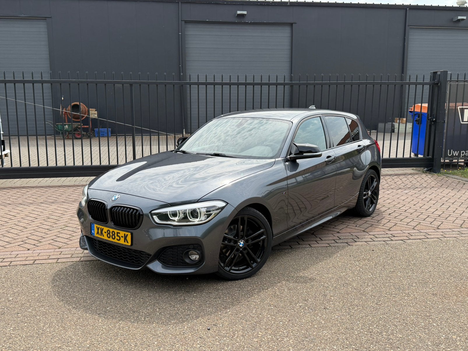 BMW 1-Serie 116i 109pk 2017 Grijs, Auto's, 1-Serie, Dealer onderhouden, Achterwielaandrijving, 1280 kg