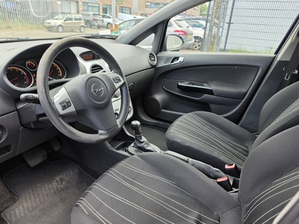 Opel Corsa 1.4-16V Enjoy Automaat Airco Nw APK ✅, Automaat, 15 km/l, Gebruikt, 4 cilinders