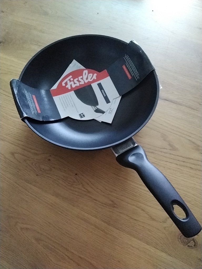 Fissler wok, Ophalen, Antiaanbaklaag, Gietijzer, Nieuw