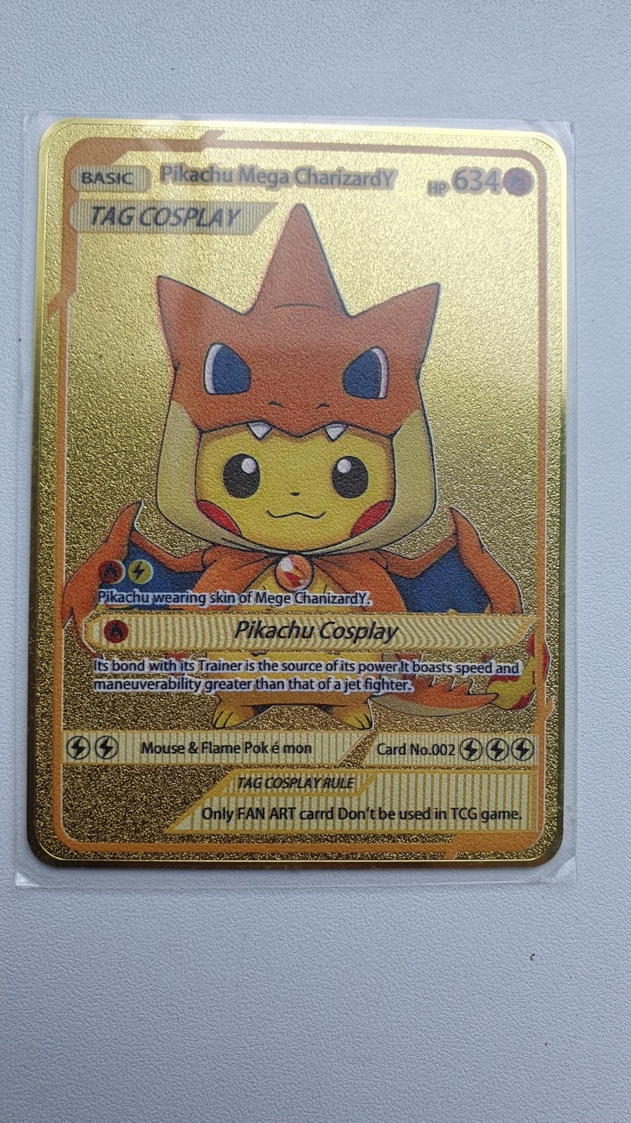 Pikachu Poncho Charizard Artwork Metalen Pokemon kaart Goudk, Verzenden, Nieuw