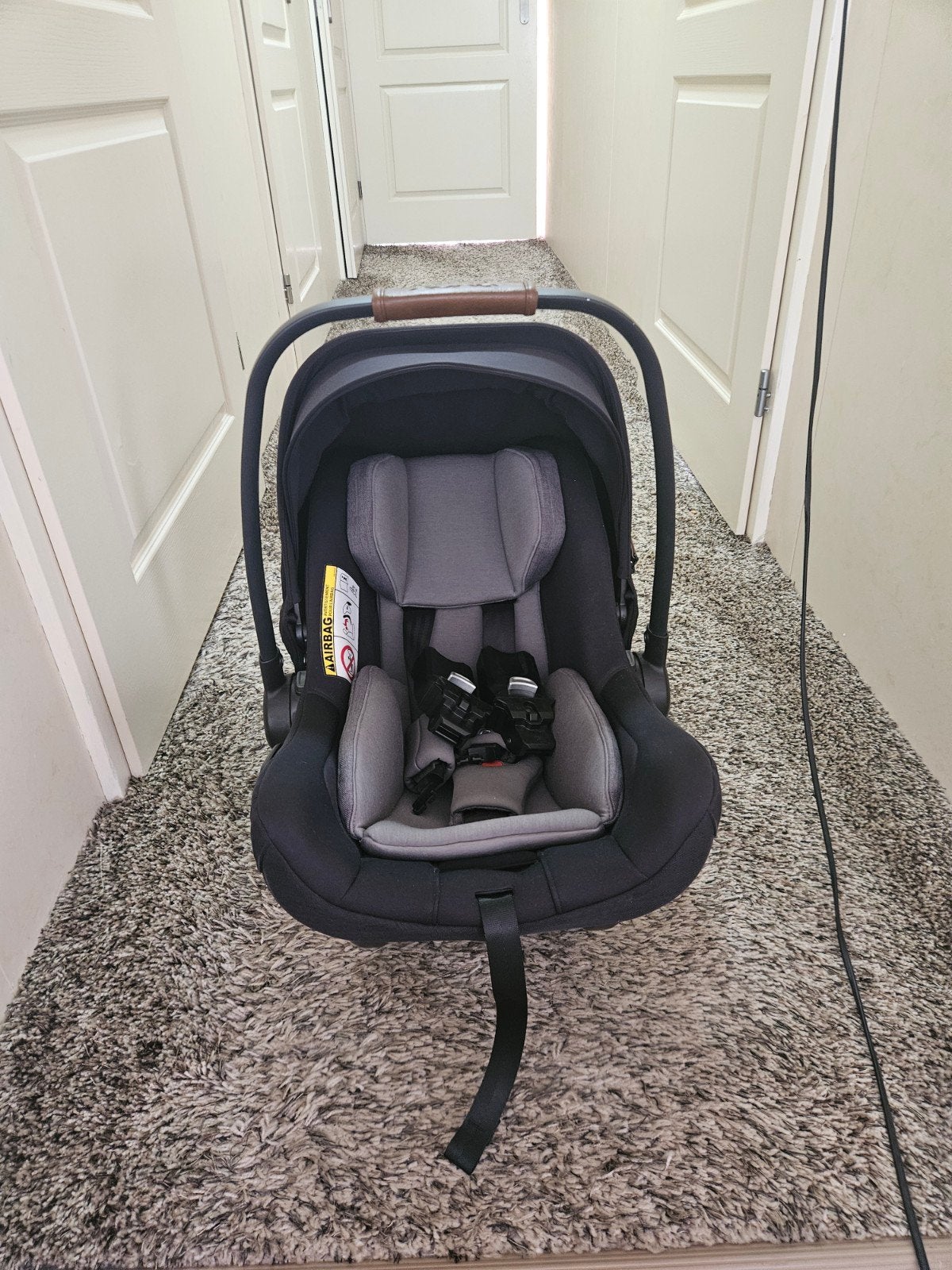 nuna Autostoel PIPA next Caviar (Leather Handle Chocolate), Zijbescherming, Zo goed als nieuw, Isofix, 0 t/m 13 kg