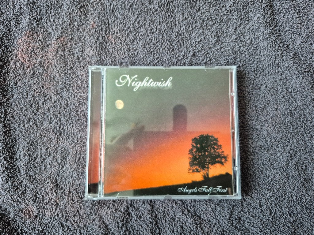 Nightwish - Angels Fall First, Inclusief boekje, Metal, Ophalen of Verzenden, Zo goed als nieuw