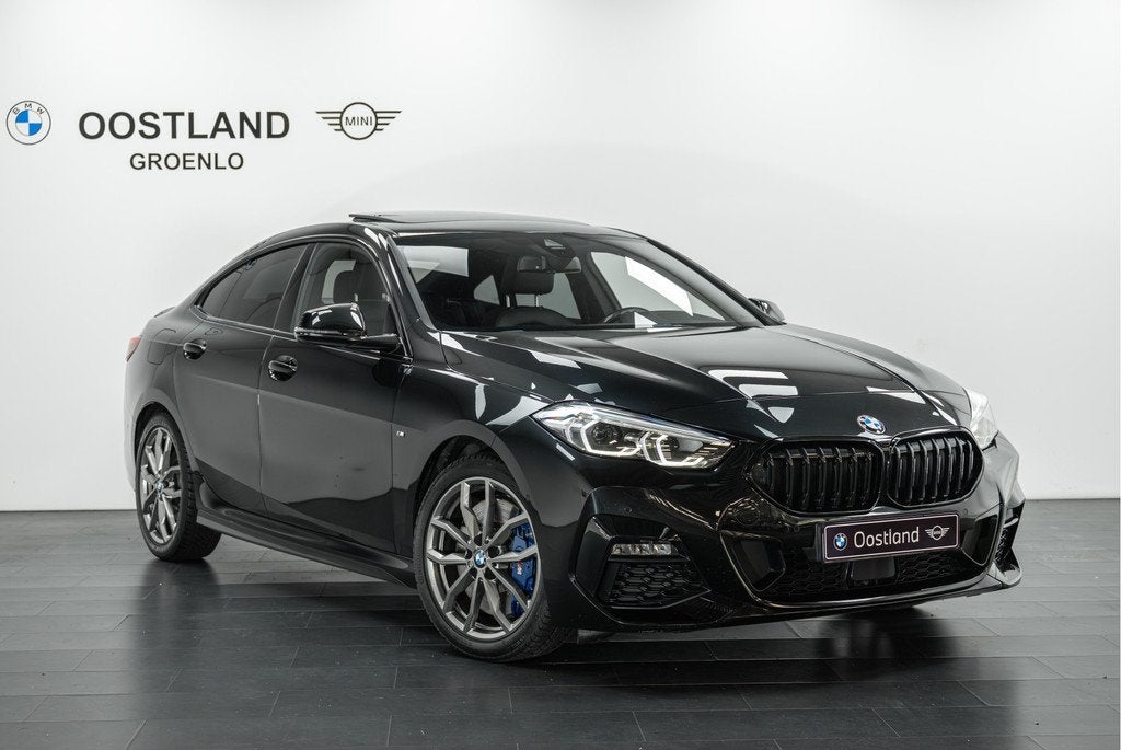 BMW 2 Serie Gran Coupé 218i Executive M Sport Automaat / Pa, Auto's, BMW, 12 maanden, 136 pk, 1350 kg, Leder en Stof