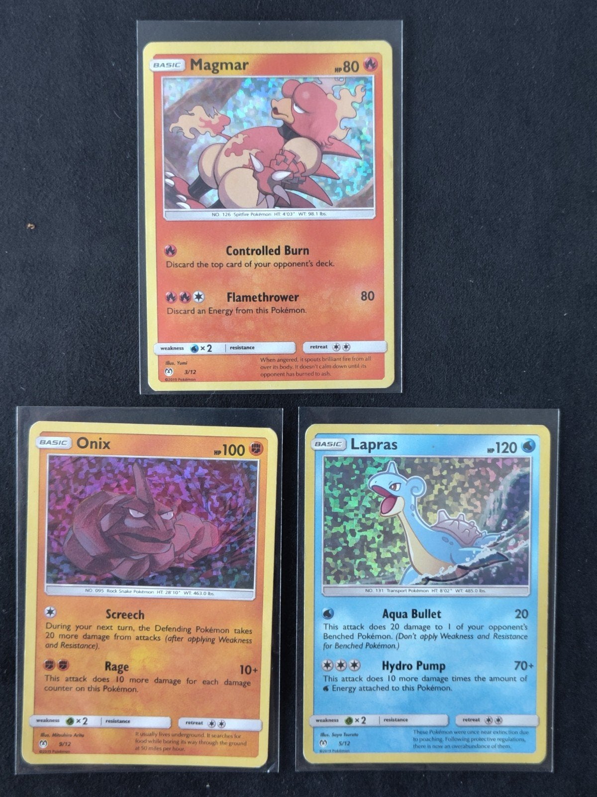 Pokémonkaarten McDonald's 2019 serie - Magmar, Onix, Lapras, Ophalen of Verzenden, Zo goed als nieuw, Meerdere kaarten, Foil
