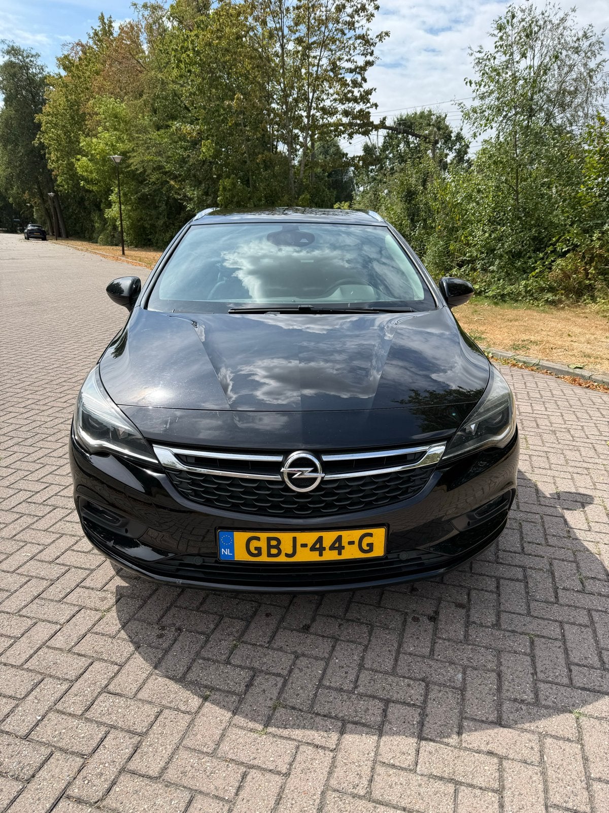 Opel Astra K sportstourer 1.4 Turbo 92KW 2018 Zwart, Auto's, Voorwielaandrijving, 125 pk, 4 cilinders, Leder en Stof