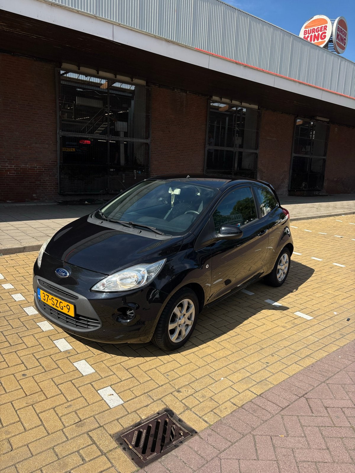 Ford Ka 1.2 69pk 2011 Zwart, Auto's, Voorwielaandrijving, Stof, 1242 cc, 4 cilinders