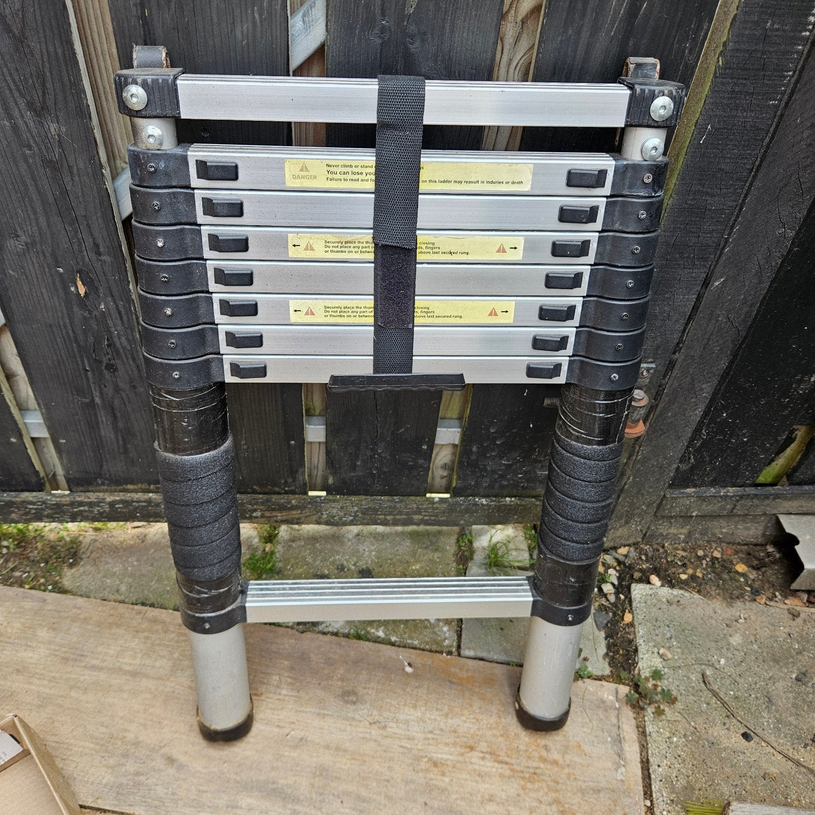 telescoop ladder., Ophalen