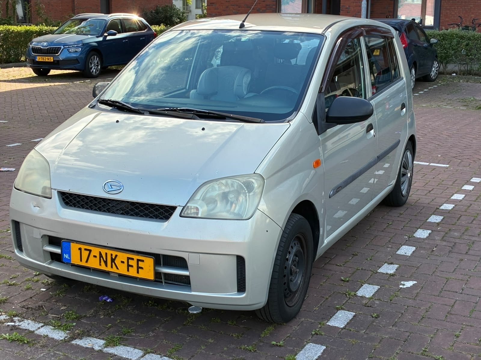 Daihatsu Cuore 1.0 5D 2003 Beige, Auto's, 600 kg, Cuore, Beige, Origineel Nederlands