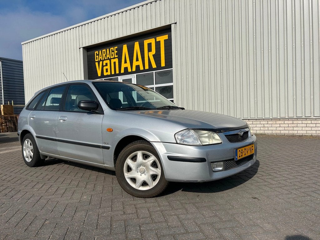 Mazda 323 Fastbreak 1.5i LX | AIRCO | AUTOMAAT | GAS PEDAAL, Auto's, Mazda, Stof, 4 cilinders, 400 kg, 1070 kg
