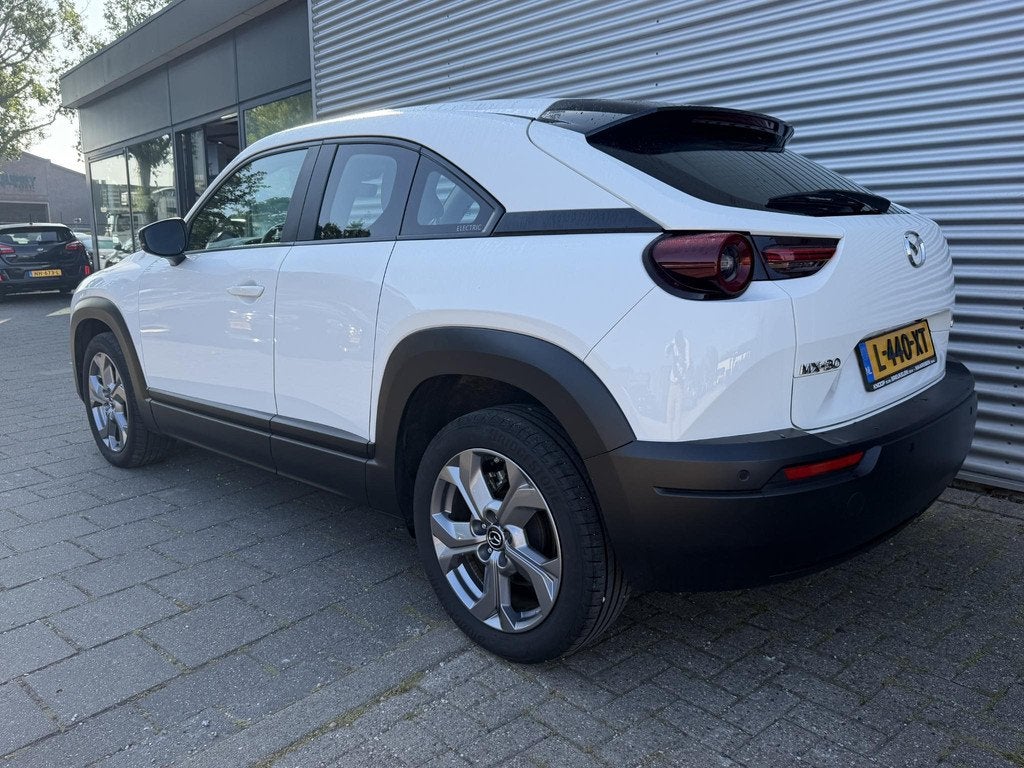 Mazda MX-30 e-SkyActiv 145 Comfort 36 kWh |SOH 96% | Eerste, Auto's, Mazda, 145 pk, Gebruikt, Zwart, Leder en Stof