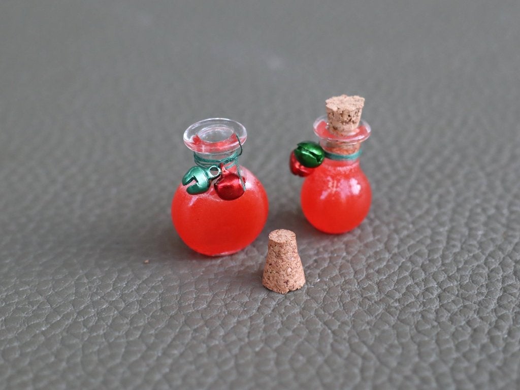 2 sierflesjes van echt glas met kerstlikeur., Ophalen of Verzenden, Nieuw, Gebruiksvoorwerp