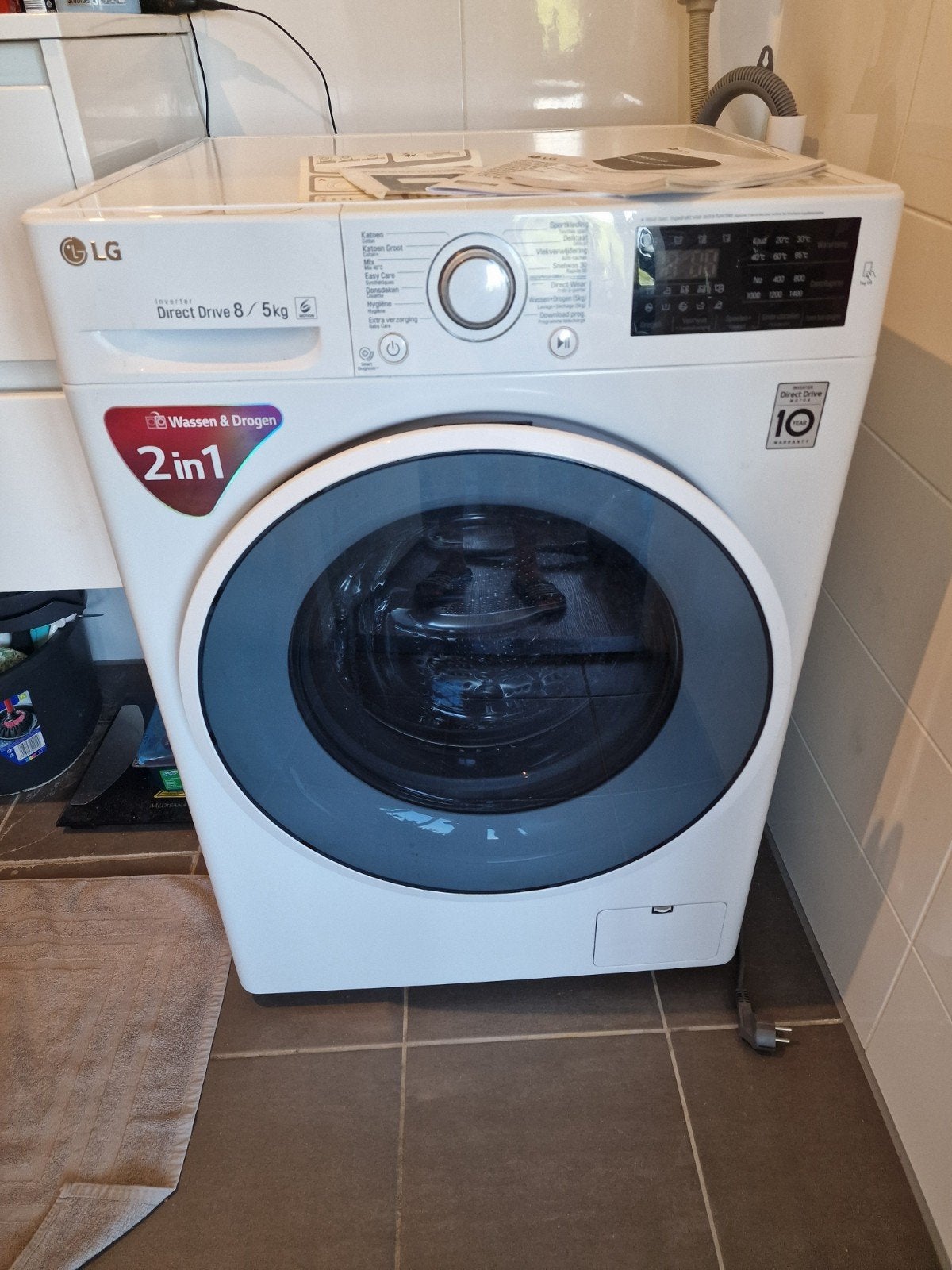 LG F4J6TM0W Direct Drive wasmachine - lekt soms water, 6 tot 8 kg, Ophalen, Gebruikt, 85 tot 90 cm