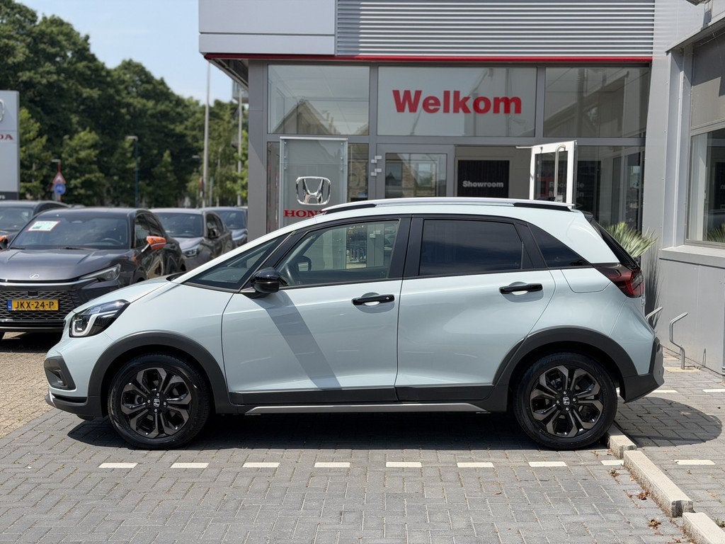 Honda Jazz 1.5 e:HEV Advance Crosstar | GEEN AFLEVERKOSTEN |, Auto's, Honda, 12 maanden, 4 cilinders, Blauw, Leder en Stof