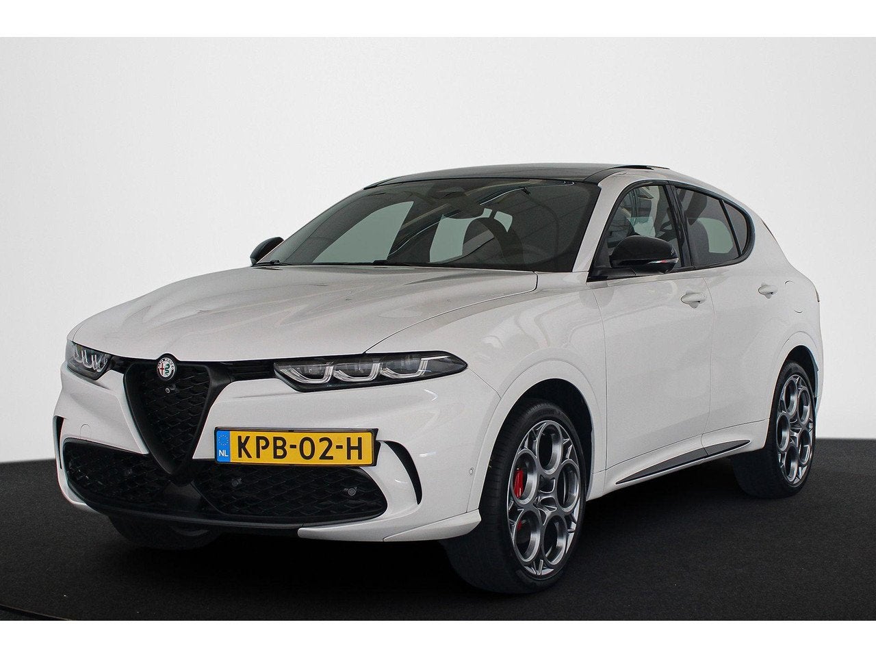Alfa Romeo Tonale 1.3T PHEV Tributo Italiano SOH 99% Panoram, Auto's, Automaat, Gebruikt, 4 cilinders, Leder