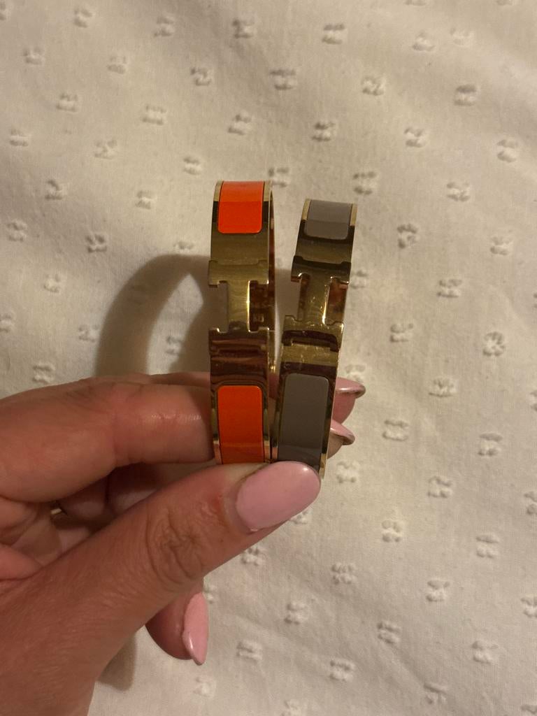 Twee Hermès armbanden in oranje en taupe, Sieraden, Tassen en Uiterlijk, Armbanden, Overige materialen, Oranje, Ophalen of Verzenden