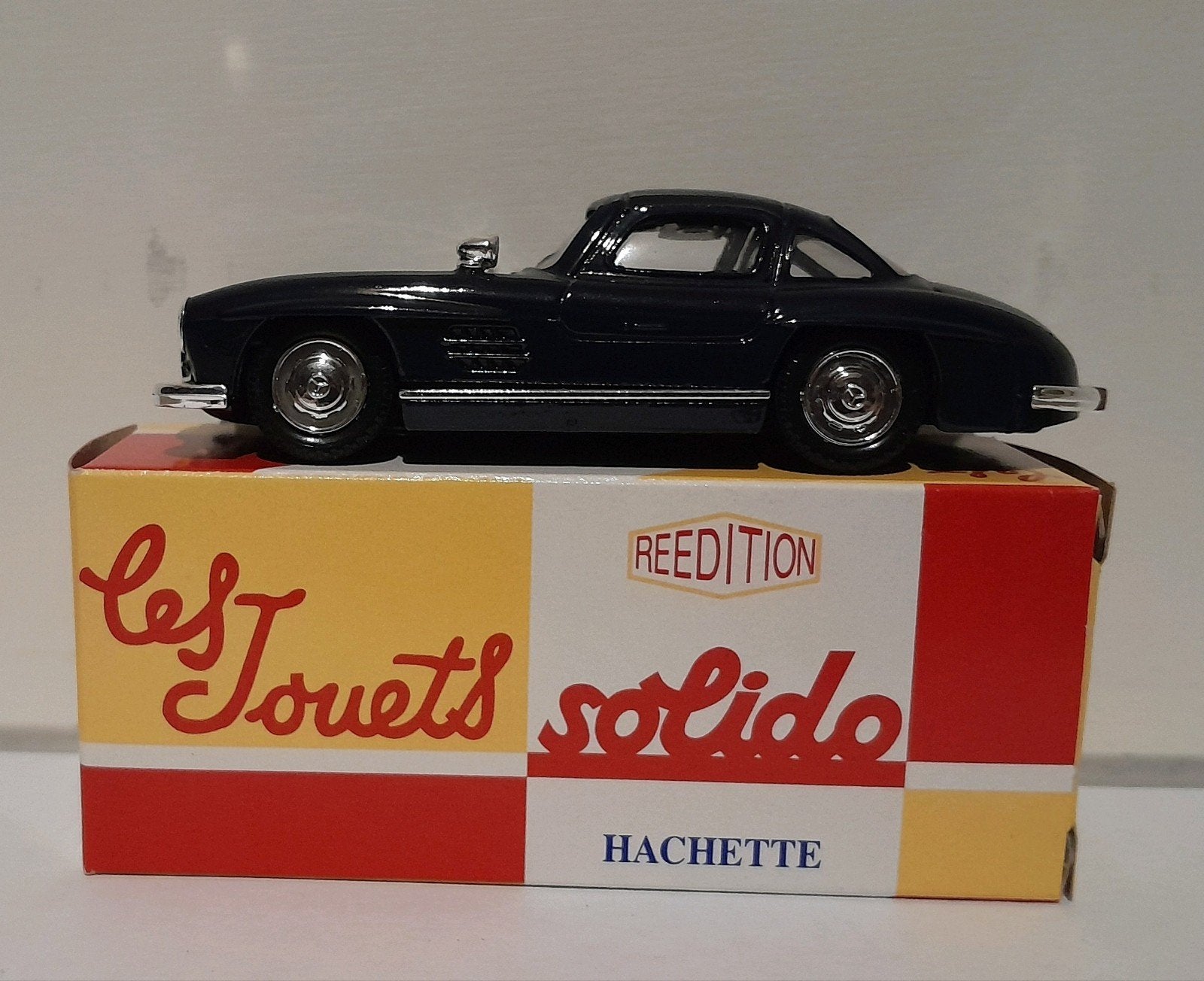 Solido Mercedes 300 SL zwart 1/43 z.g.a.n., Hobby en Vrije tijd, Ophalen of Verzenden, Zo goed als nieuw, Auto, Solido