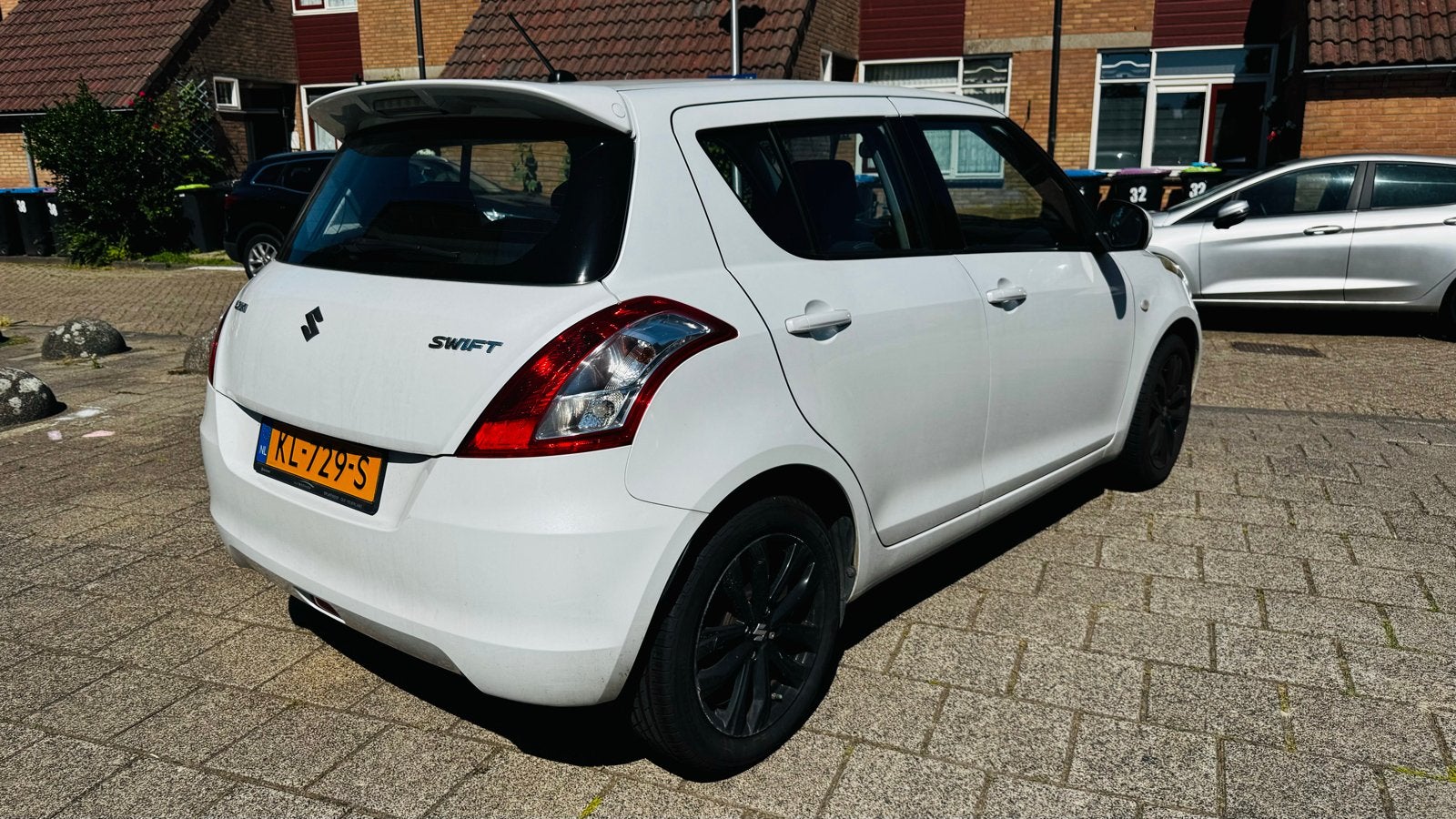 Suzuki Swift Bandit- 1.2 5D 2016 Wit - 1e eigenaar, Stof, 4 cilinders, 400 kg, Origineel Nederlands
