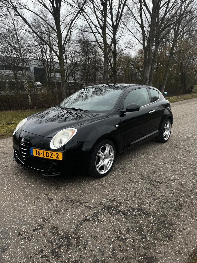 Alfa Romeo MiTo 1.4 16V 77KW Multi AIR 2010 Zwart, STORING, Auto's, Stof, Zwart, 4 cilinders, Origineel Nederlands