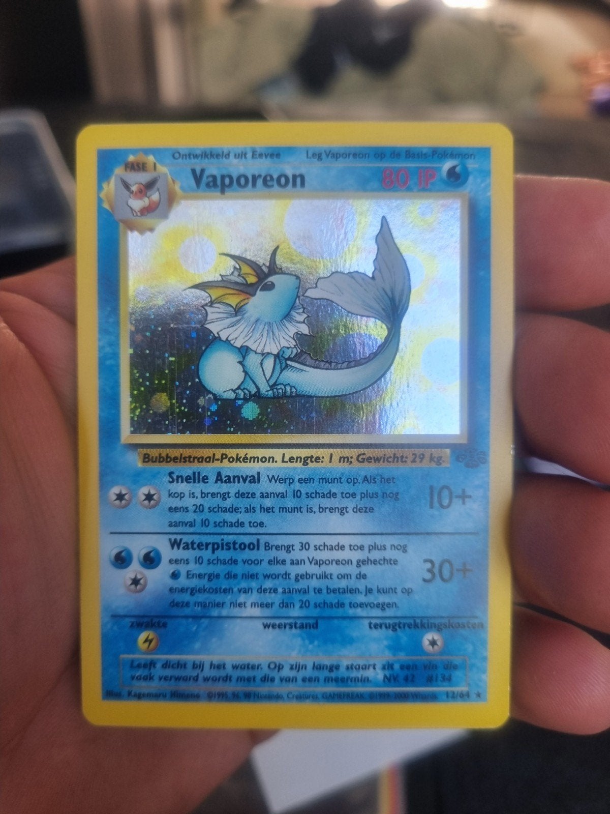 Vaporeon 12/64 jungle nederlands, holo rare * € 100, Ophalen of Verzenden, Zo goed als nieuw, Losse kaart, Foil