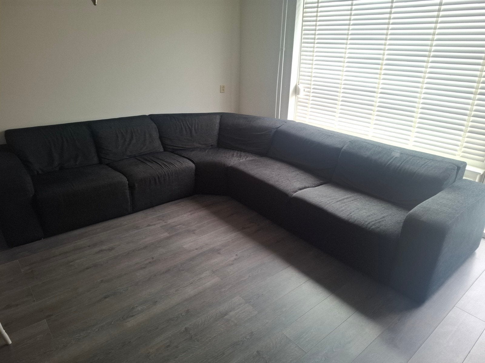 Zwarte hoekbank van Den Elzen (3.40m x 3.00m), Ophalen