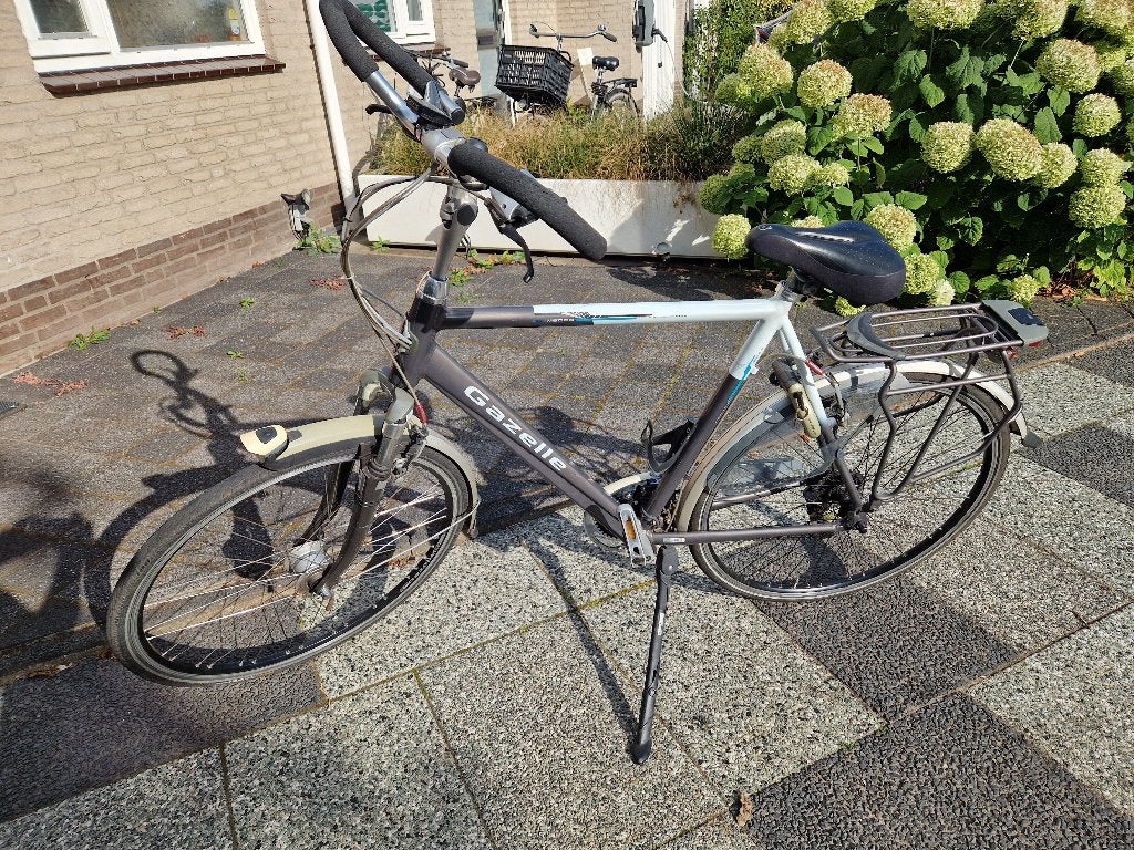 te koop  herenfiets Gazelle Medeo Plus, Velgrem, Versnellingen, Zo goed als nieuw, 57 tot 61 cm
