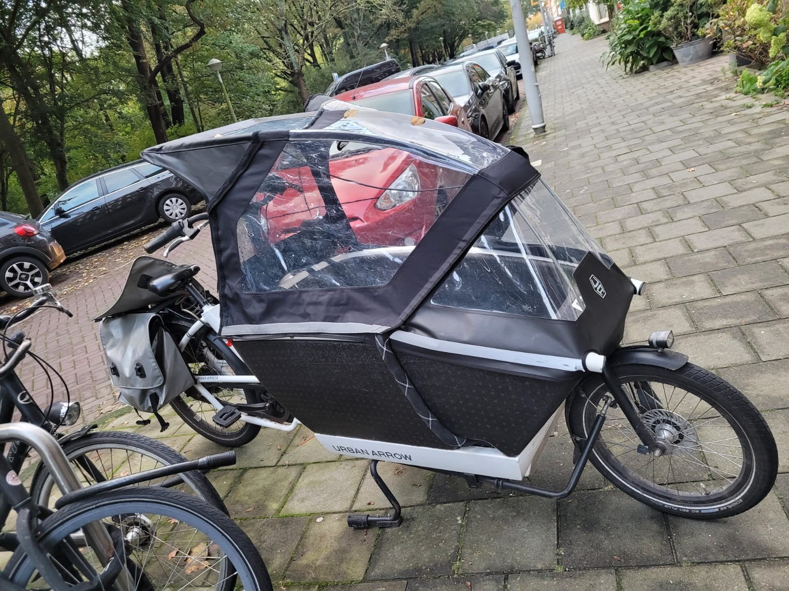 Regenhuif plus voor de urban arrow., Ophalen, Zo goed als nieuw, 1 kind