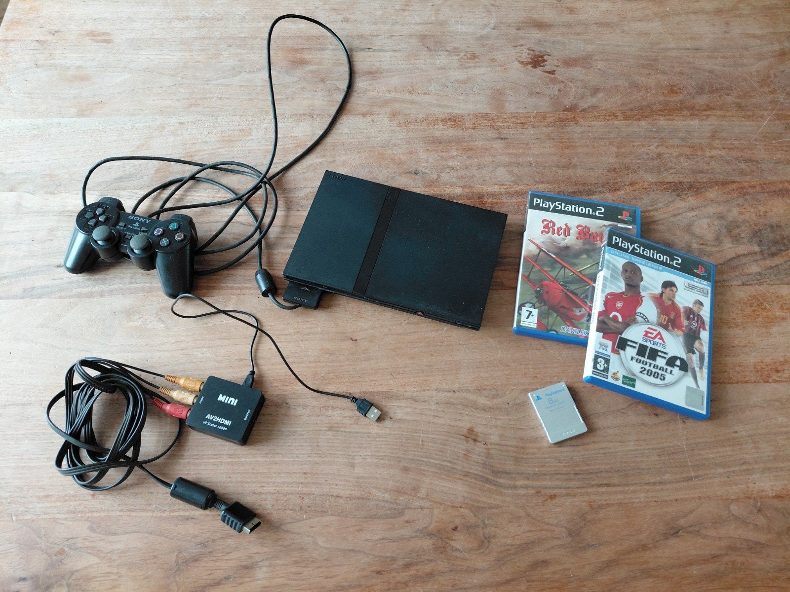 Sony PlayStation 2 Slim met controller en games, Gebruikt, Zwart, Met games, Ophalen of Verzenden