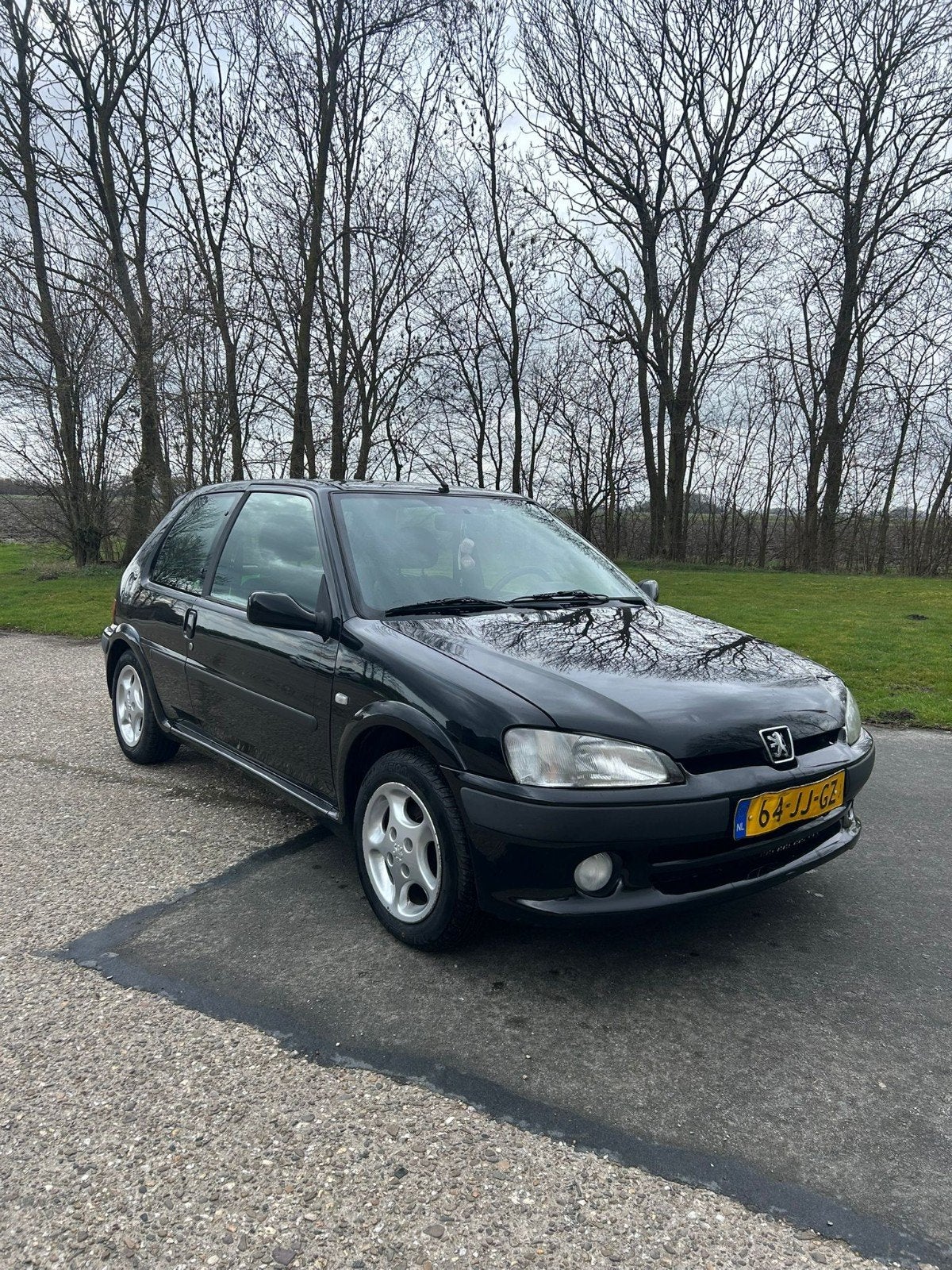 Peugeot 106 1.4 Sport 2002 Zwart, Auto's, Voorwielaandrijving, 4 cilinders, 400 kg, Zwart