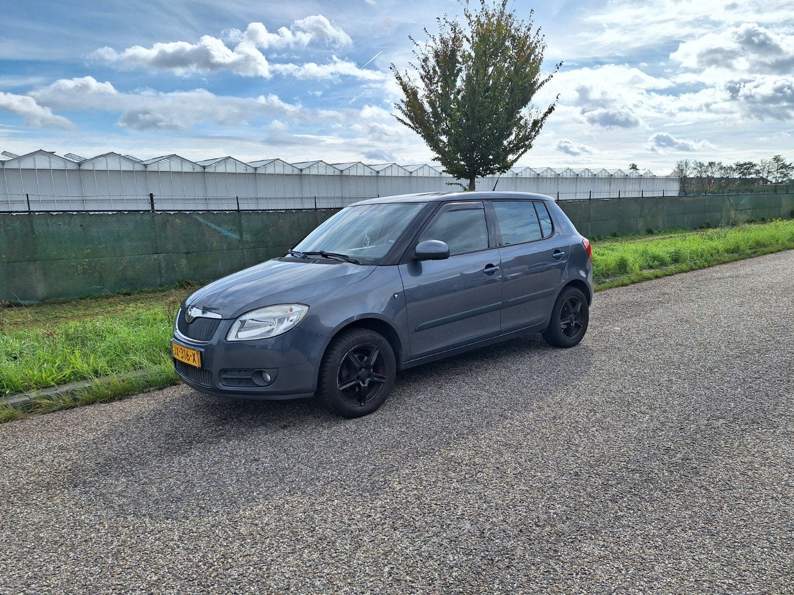 Automaat Fabia 1.6 16V 77KW AUT 2009 Grijs, Auto's, 4 cilinders, 49 €/maand, Bedrijf, 1000 kg