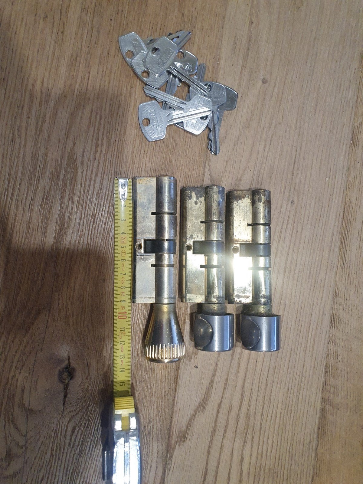 DOM SKG knop cilinders met sleutels, Ophalen of Verzenden, Gebruikt, Koper of Messing, Slot