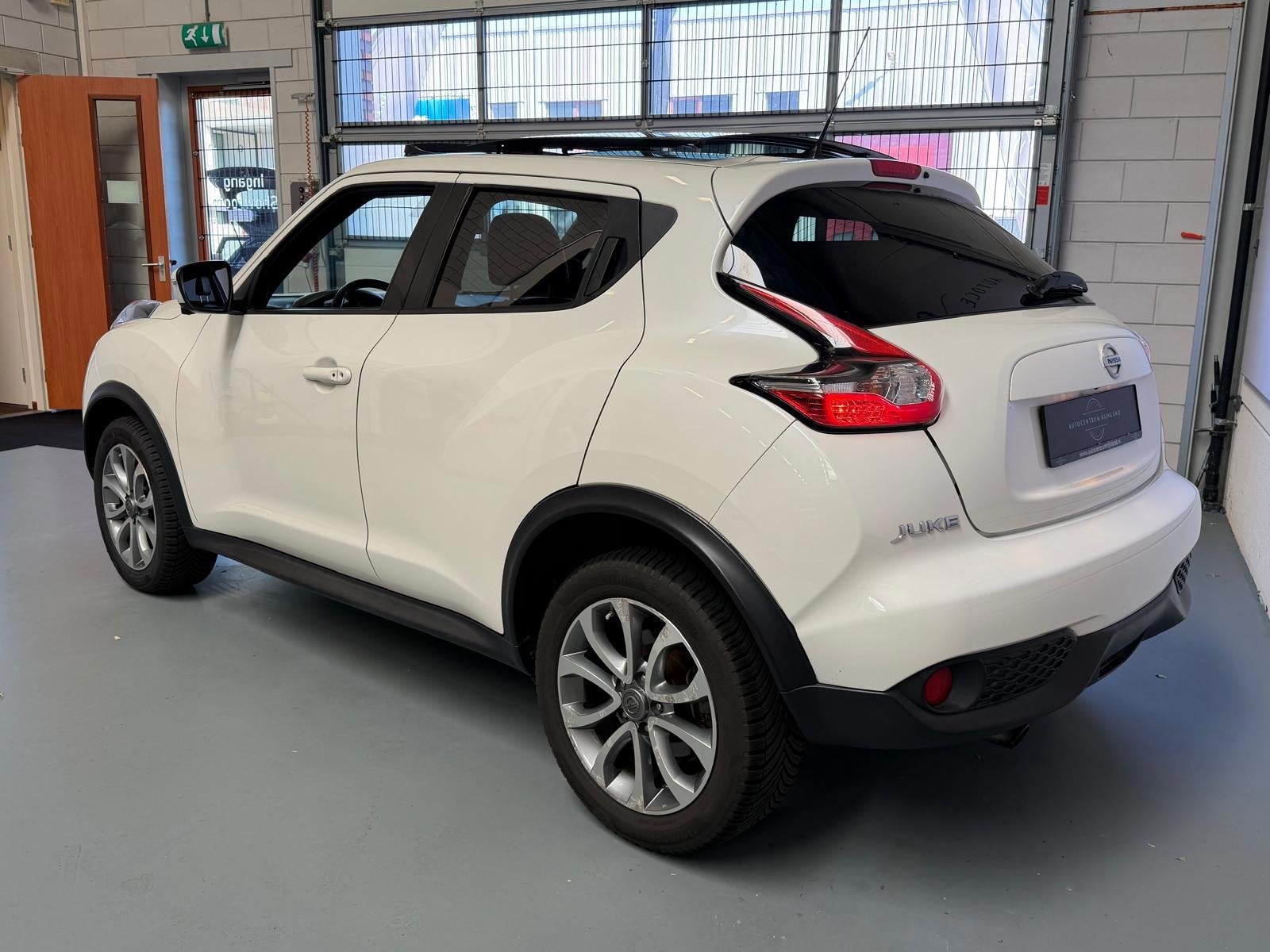 Nissan Juke 1.2 DIG-T S/S Tekna, Pano, Navi, Cruise, camera,, Auto's, Voorwielaandrijving, 1250 kg, 116 pk, Wit