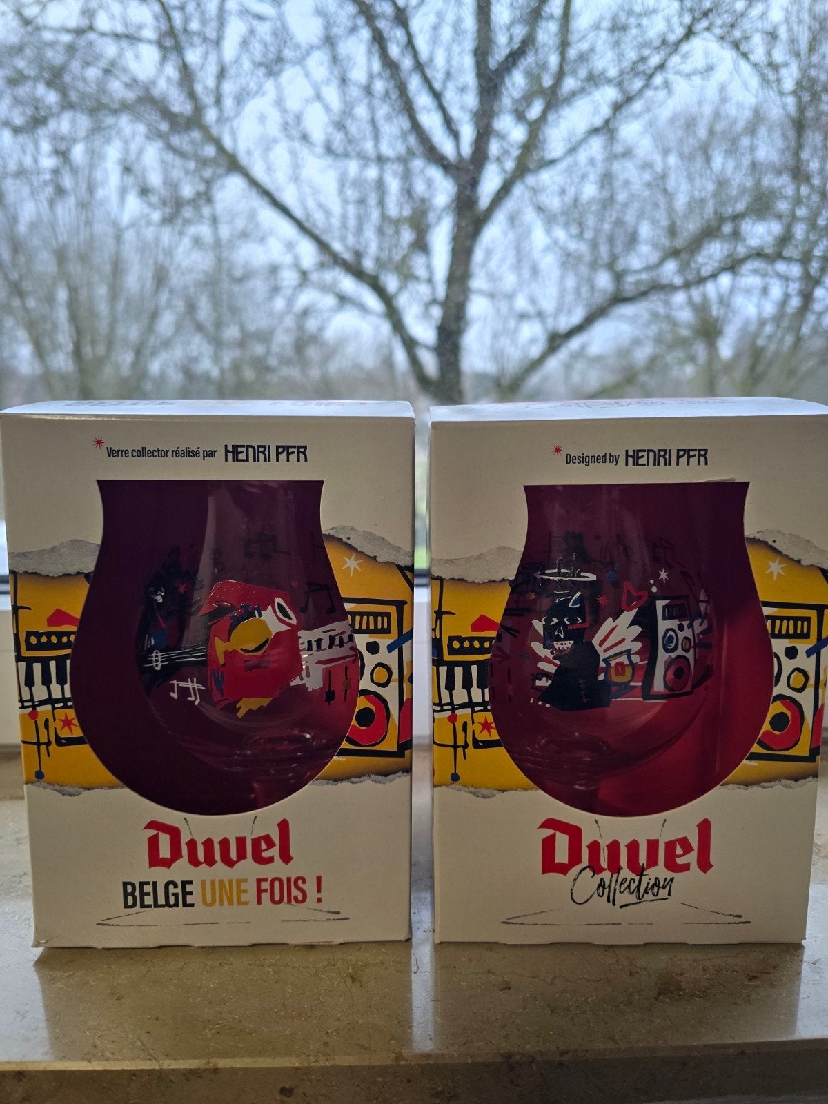 2 Duvel glazen Henri PFR 2 versies doosjes, Ophalen of Verzenden, Zo goed als nieuw, Glas of Glazen, Duvel