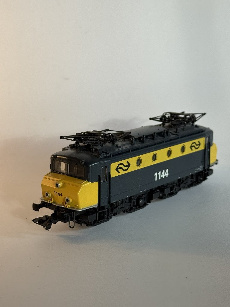 Märklin 37241 H0 E-loc NS 1144 botsneus geel/grijs digitaal, Wisselstroom, Gebruikt, Locomotief, Ophalen of Verzenden