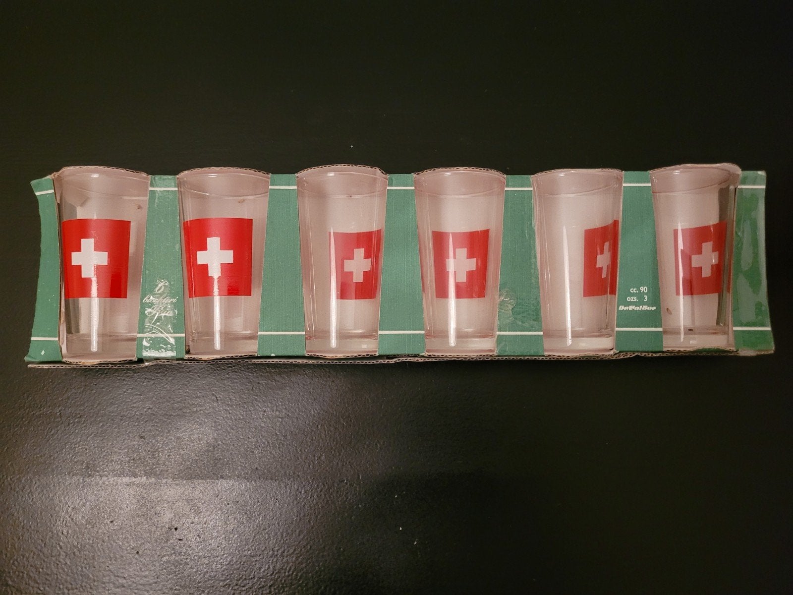 6 witte wijnglazen, borrelglaasje vlag/ gentiaan Zwitserland, Verzamelen, Ophalen of Verzenden, Nieuw, Borrel- of Shotglas