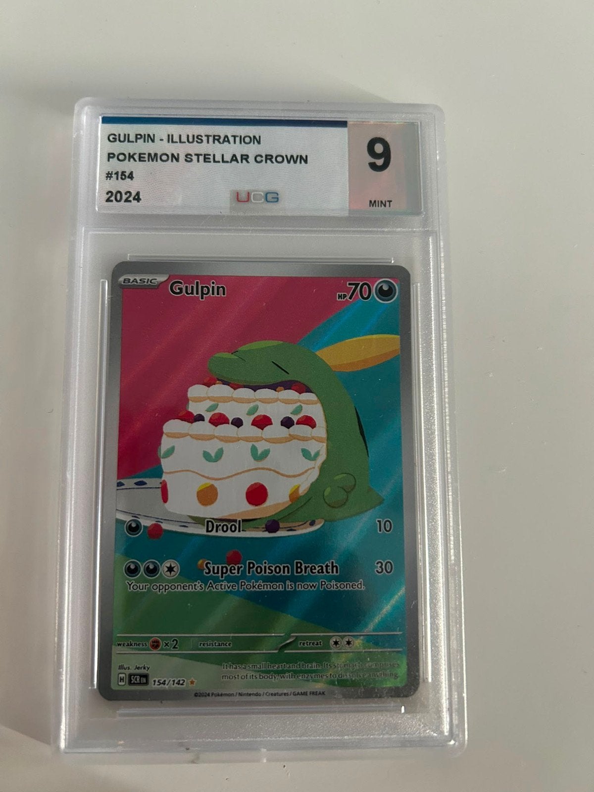 Gulpin - Illustration Pokemon Stellar Crown #154 Graded 9, Hobby en Vrije tijd, Verzamelkaartspellen | Pokémon, Ophalen of Verzenden