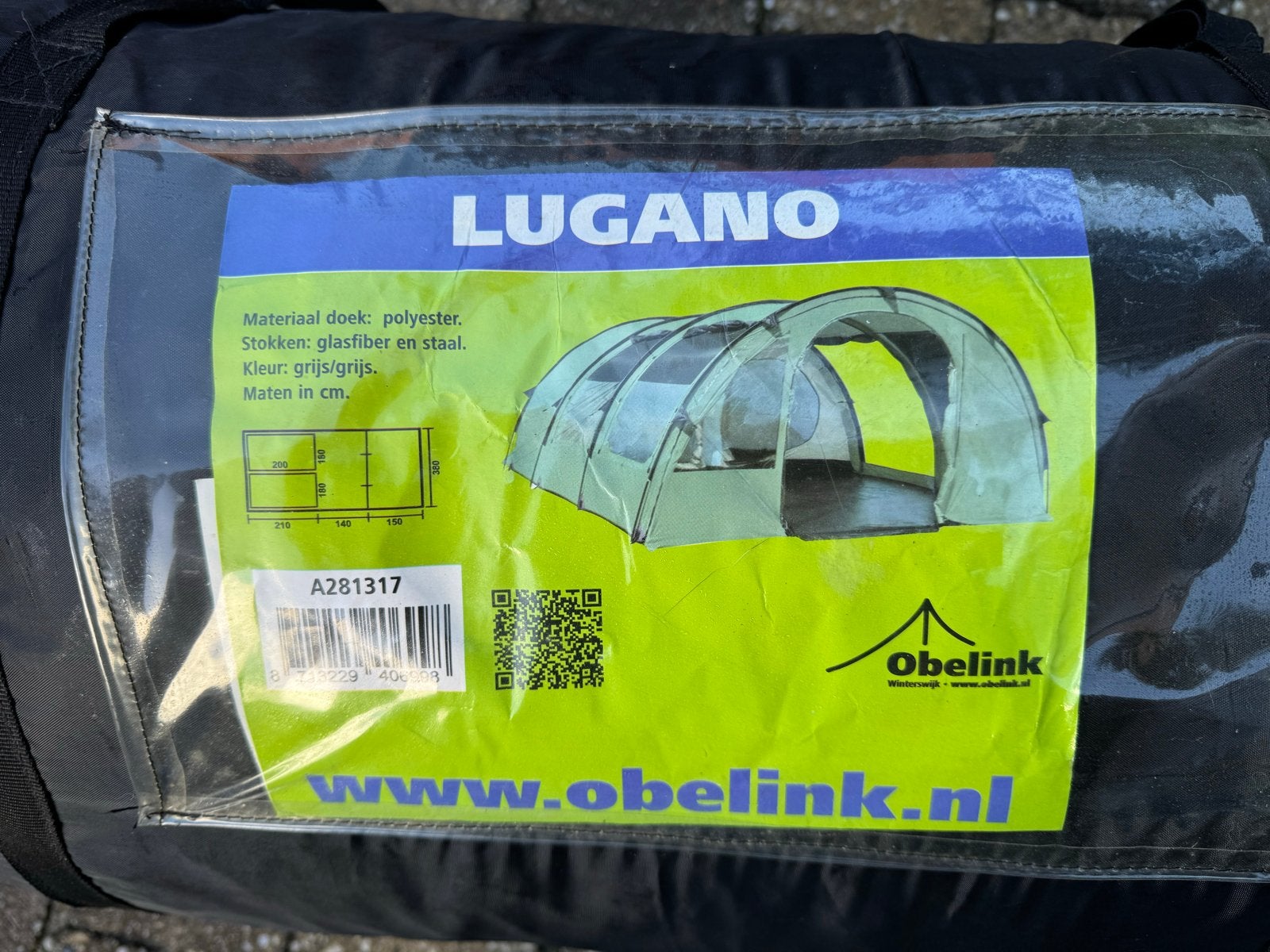 Obelink Lugano 6-persoons familietent - Zo goed als nieuw, Caravans en Kamperen, Ophalen, Zo goed als nieuw, Tot en met 6