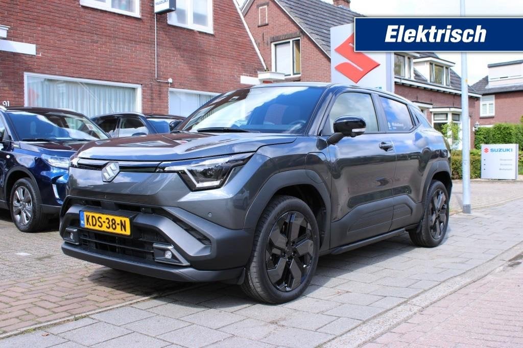 Suzuki E-VITARA STYLE 61 KWH / BTW-Auto / Rijklaarprijs / To, Auto's, 44 min, Met garantie (alle), Origineel Nederlands, 61 kWh