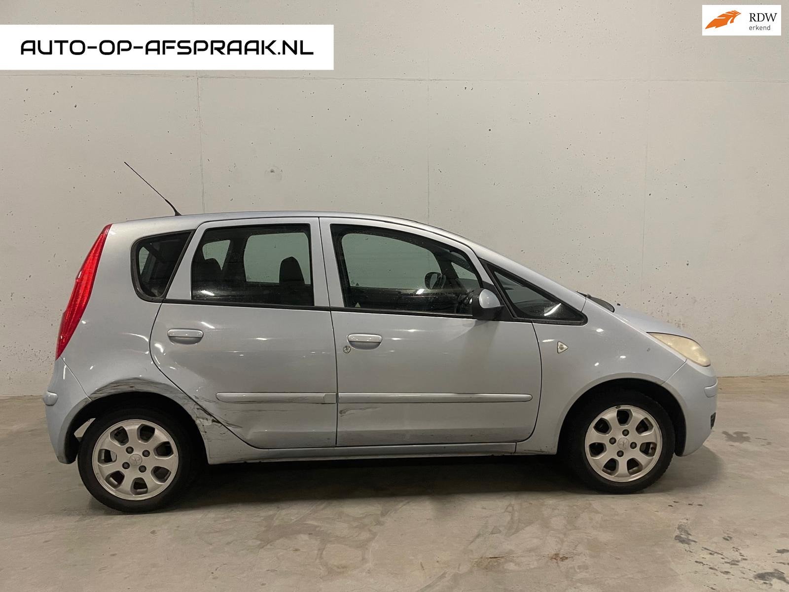 Mitsubishi Colt 1.3 Automaat Airco 5drs. PDC, Stof, Gebruikt, 31 €/maand, Blauw