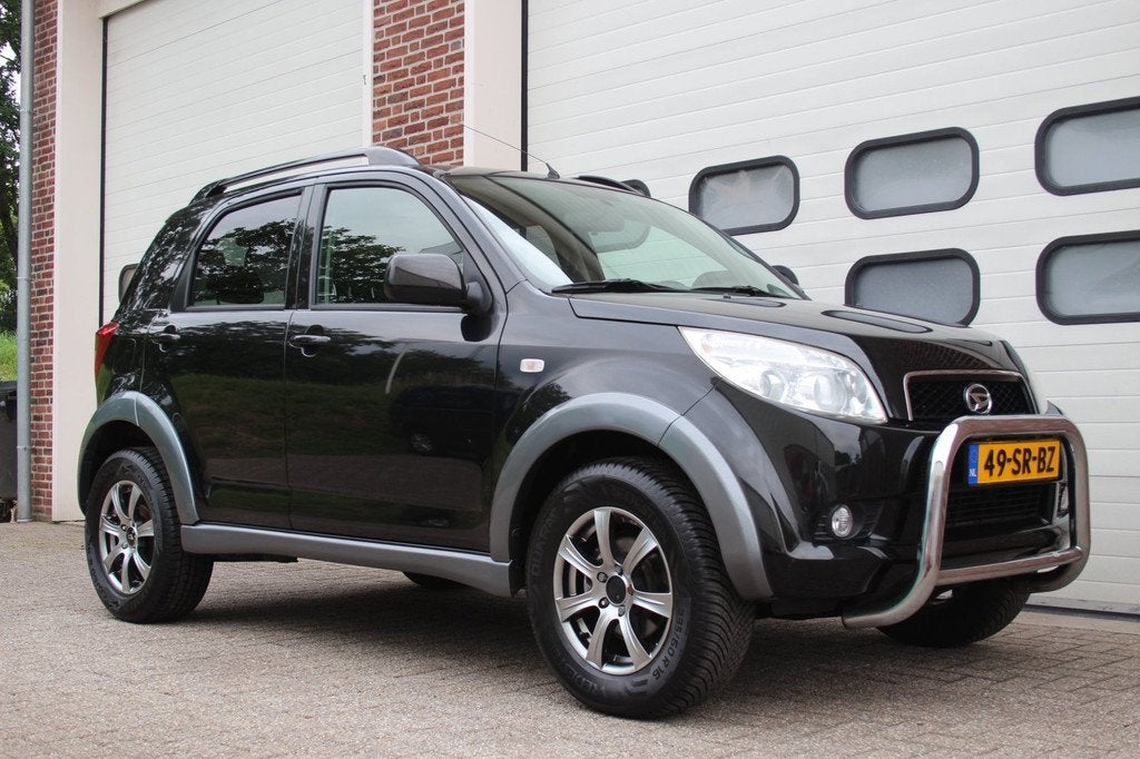 Daihatsu Terios 1.5-16v Exclusive * 4WD / 50.004Km Nap! *, Auto's, Daihatsu, 1350 kg, Stof, Gebruikt, Zwart